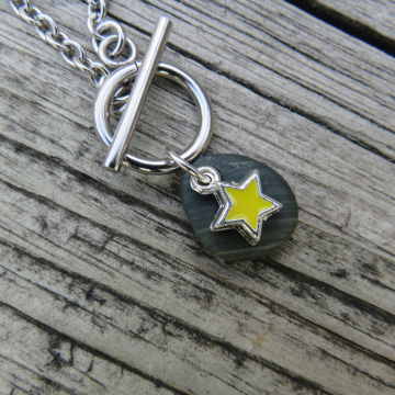 Yellow Star Over Black Rock